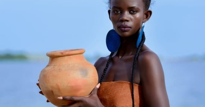 afro woman with jar