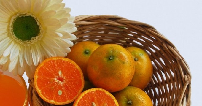 Oranges for Oshún offering with honey